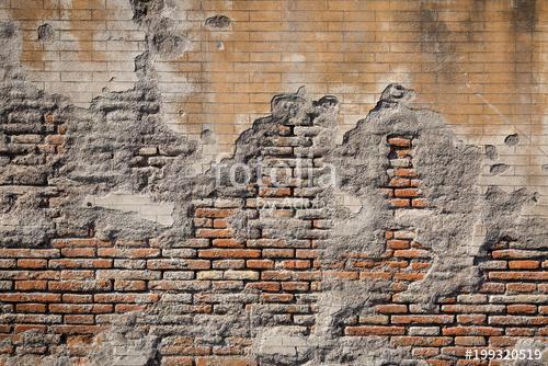 Weathered plaster and brick wall textured background , Premium Kollekció