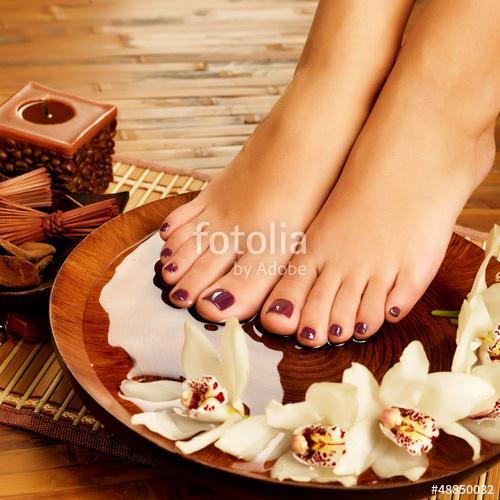 female feet at spa salon on pedicure procedure, Premium Kollekció