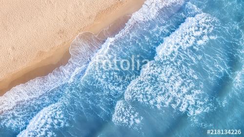 Wave on the beach as a background. Beautiful natural background at the summer time. Aerial seascape from drone at the summer tim, Premium Kollekció