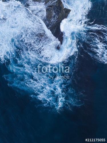 Top down view of water breaking into the side of rocks., Premium Kollekció